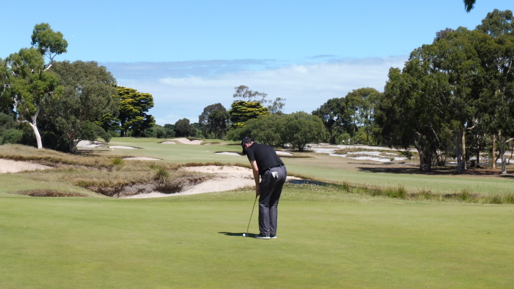 James putting on the 15th green at Victoria Golf Club