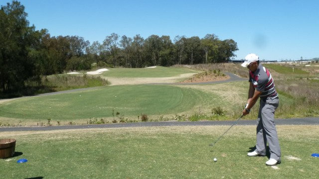 Aaron teeing off at Stonecutters Ridge Golf Club