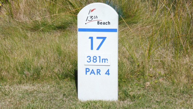 Hole marker at Thirteenth Beach Golf Links Beach Course