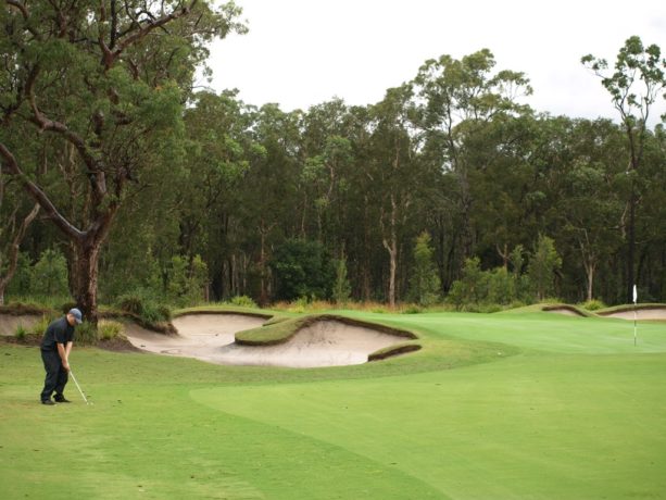 The 14th green at Pacific Dunes Golf Club