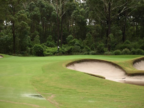 The 15th green at Pacific Dunes Golf Club