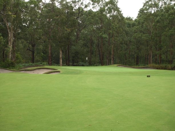 The 6th green at Pacific Dunes Golf Club