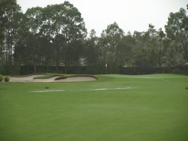 The 9th green at Pacific Dunes Golf Club