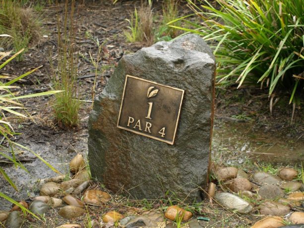 Hole marker at Pacific Dunes Golf Club