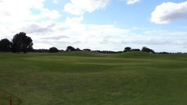 The 15th green at Thirteenth Beach Golf Links Creek Course