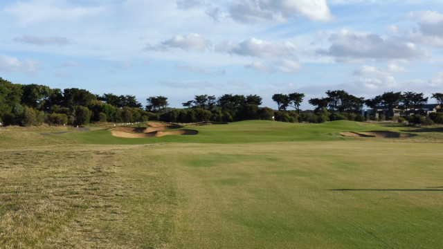 The 18th green at Thirteenth Beach Golf Links Creek Course