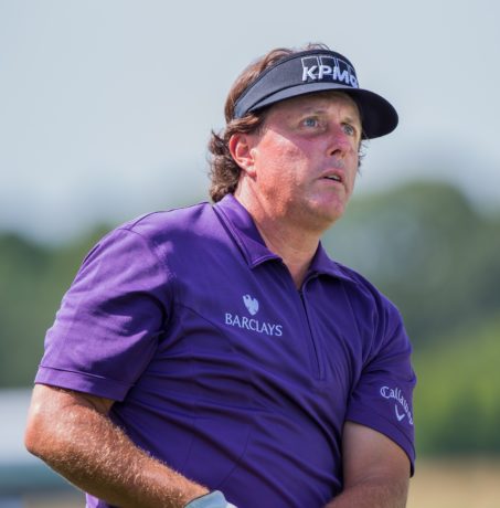 Phil Mickelson looking at the ball flight