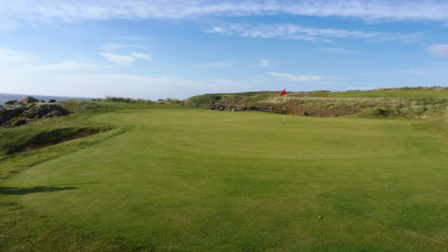 The 11th green at Cape Wickham Links