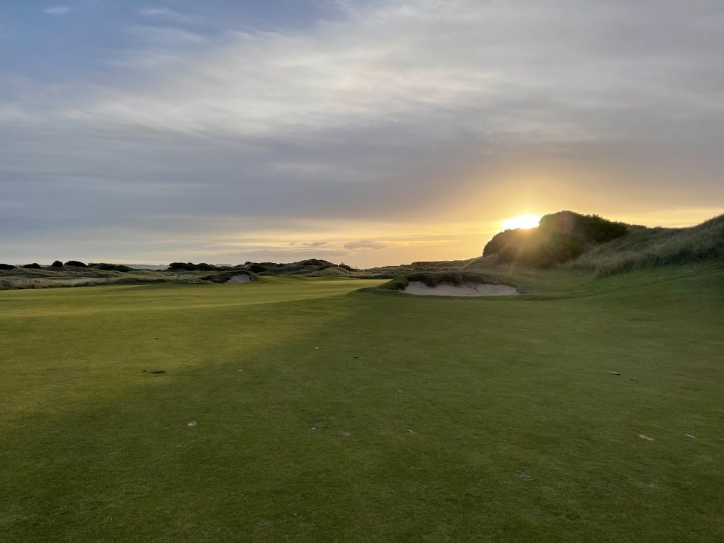 Sun setting over the dune on the 16th hole at Barnbougle Lost Farm